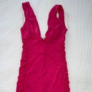 Hot pink bodycon fit mini dress
Size S